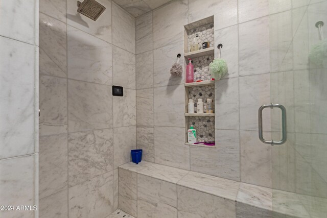 bathroom featuring walk in shower