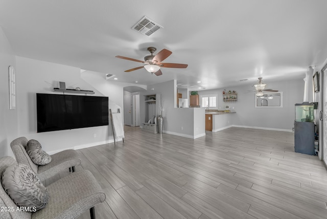 23693 W Grove St, Buckeye, AZ 85326 - living area featuring a ceiling fan, light wood-style floors, baseboards, and recessed lighting