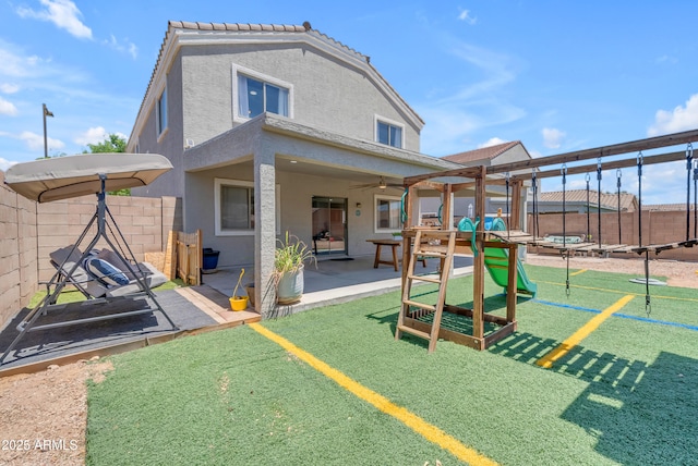23693 W Grove St, Buckeye, AZ 85326 - view of play area with a patio and a trampoline