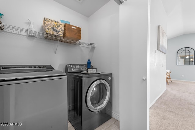 23693 W Grove St, Buckeye, AZ 85326 - laundry area with washing machine and clothes dryer, baseboards, and light carpet