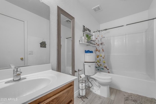 23693 W Grove St, Buckeye, AZ 85326 - full bathroom featuring toilet, vanity, shower / tub combo, and wood finished floors