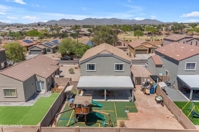 23693 W Grove St, Buckeye, AZ 85326 - aerial view of residential area with a mountain backdrop