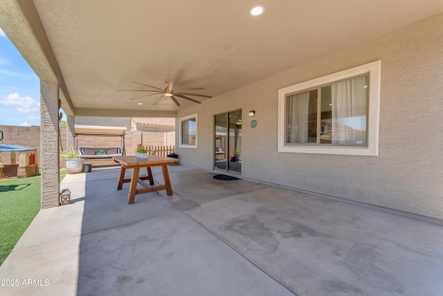 23693 W Grove St, Buckeye, AZ 85326 - view of patio / terrace with a fenced backyard, ceiling fan, and a jacuzzi