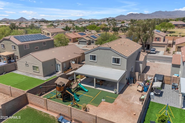 23693 W Grove St, Buckeye, AZ 85326 - aerial perspective of suburban area featuring a mountainous background