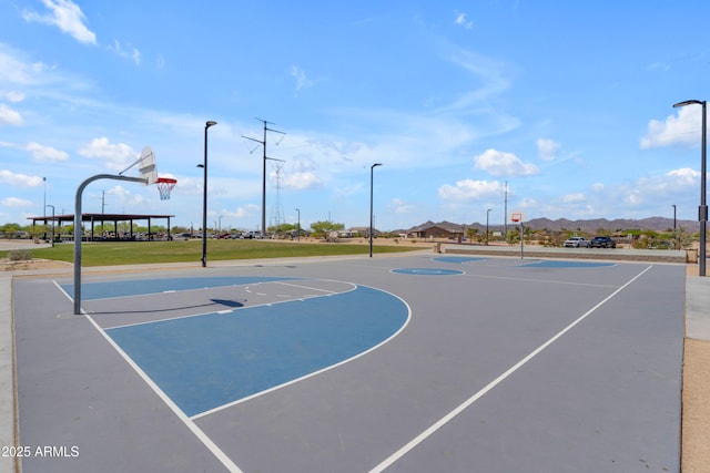 23693 W Grove St, Buckeye, AZ 85326 - view of basketball court featuring community basketball court, a mountain view, and a yard
