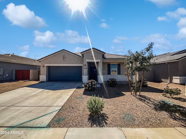 ranch-style home with a garage