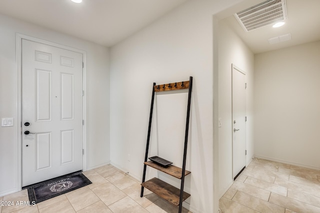 view of tiled entrance foyer