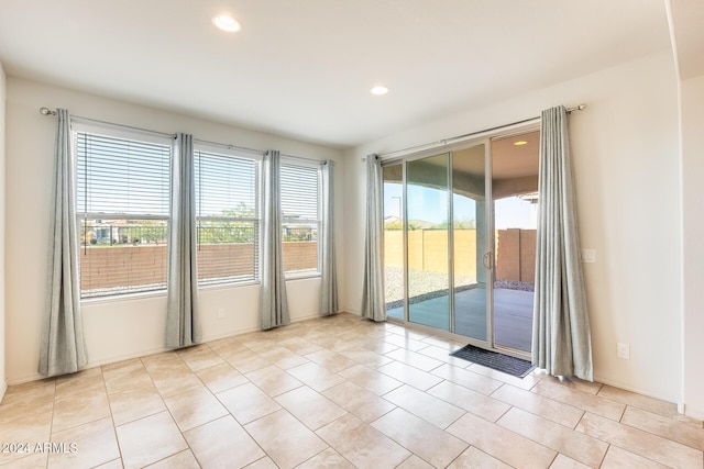 empty room featuring light tile patterned floors