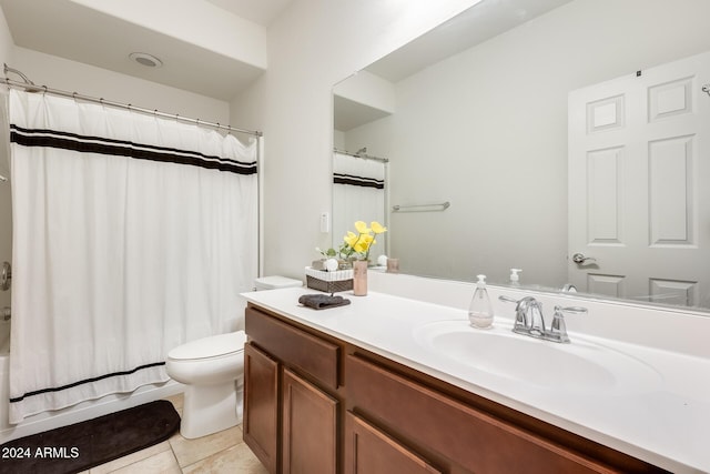 full bathroom featuring tile patterned flooring, shower / bath combo, vanity, and toilet