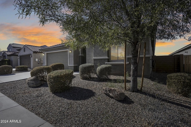 view of front of property with a garage