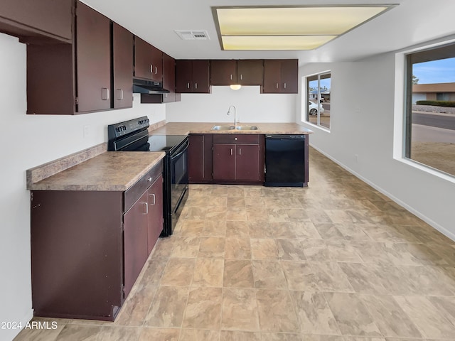 kitchen with sink, light tile patterned flooring, black appliances, and dark brown cabinetry