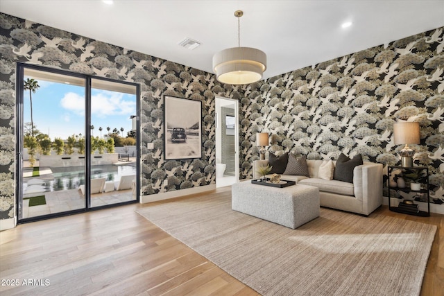 unfurnished living room featuring light wood-type flooring