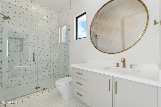 bathroom with toilet, a shower with door, vanity, and tile patterned flooring