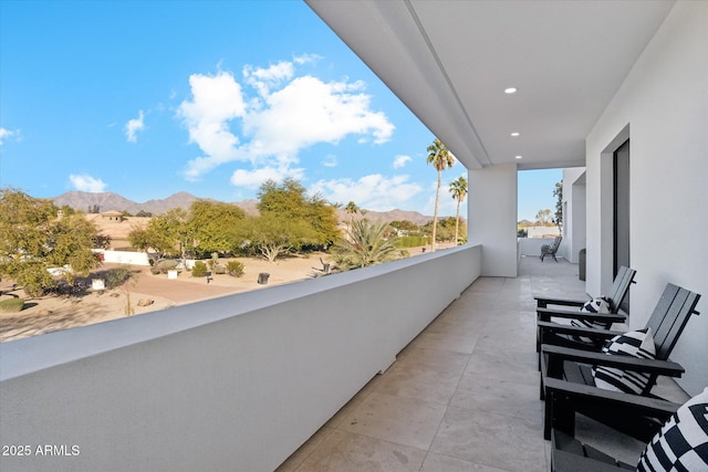 balcony featuring a mountain view