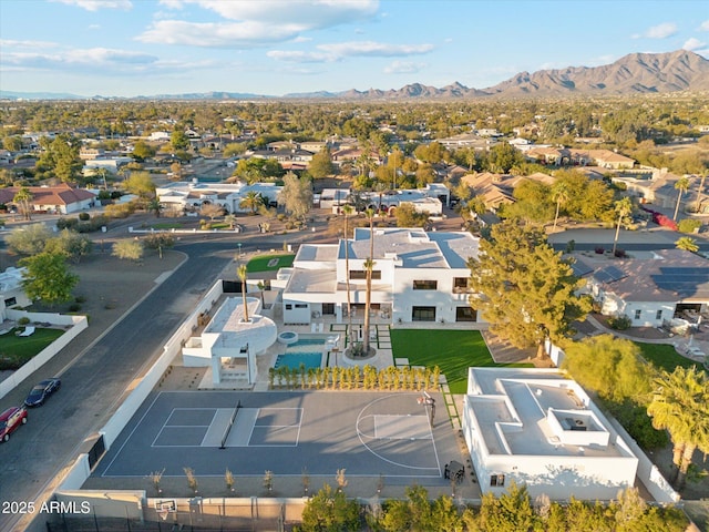 birds eye view of property featuring a mountain view