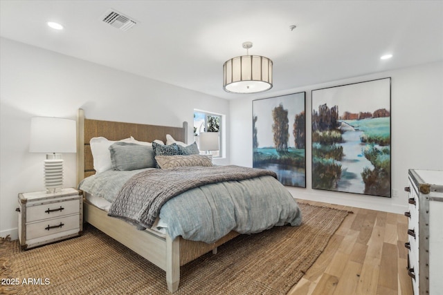 bedroom featuring light hardwood / wood-style flooring