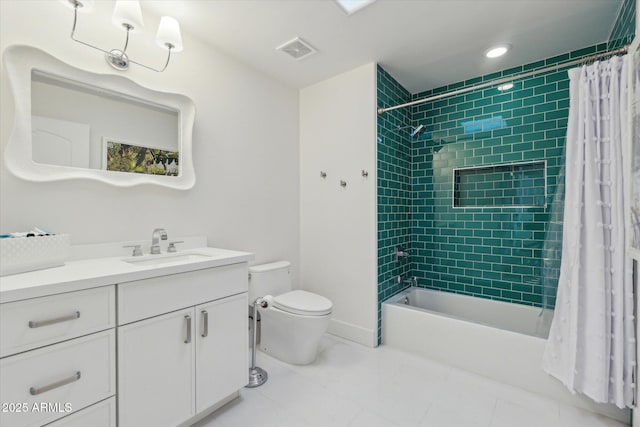 full bathroom featuring toilet, tile patterned flooring, shower / bath combo, and vanity