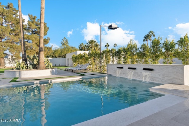 view of pool featuring a patio and pool water feature