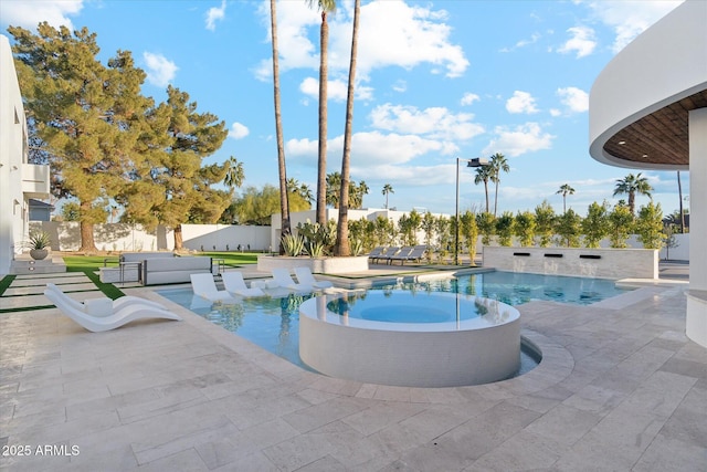 view of pool featuring an in ground hot tub and a patio