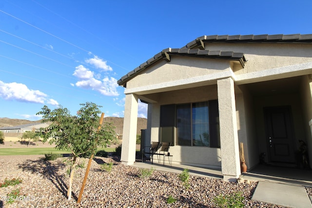 4923 W Weeping Willow Way, Laveen, AZ 85339 - back of house featuring stucco siding