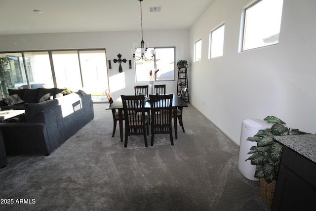 4923 W Weeping Willow Way, Laveen, AZ 85339 - carpeted dining area featuring a chandelier
