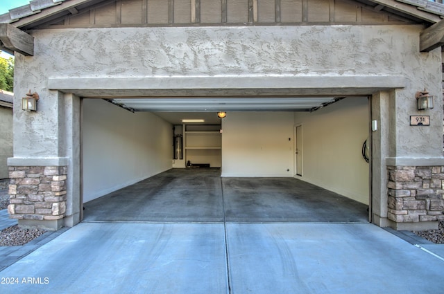 garage featuring strapped water heater