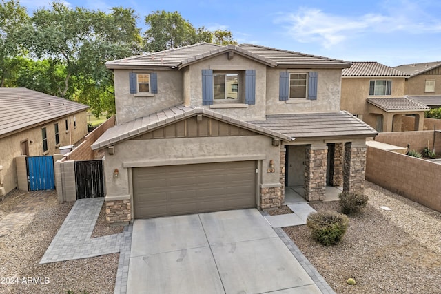 view of front of home with a garage