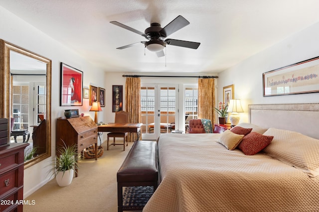 bedroom featuring french doors, ceiling fan, carpet flooring, and access to exterior