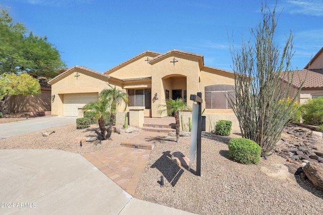 view of front of property with a garage