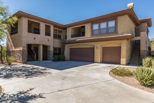 view of front of home with a garage