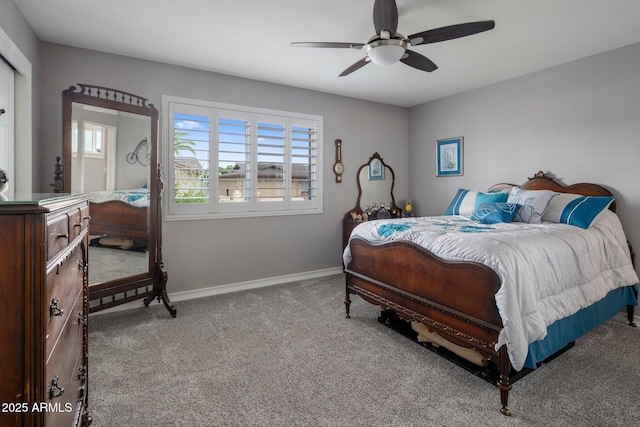 bedroom with a ceiling fan, light colored carpet, baseboards, and multiple windows