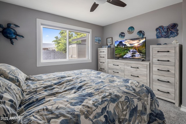 carpeted bedroom featuring a ceiling fan