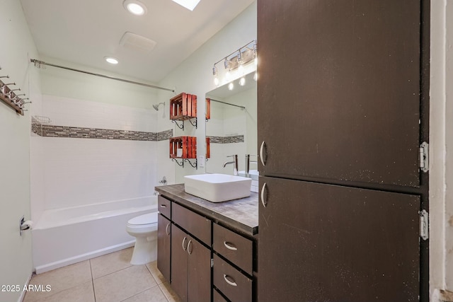 full bathroom featuring tile patterned floors, vanity, shower / bath combination, and toilet