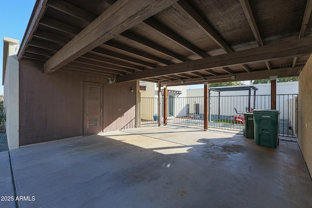 view of patio / terrace featuring a carport