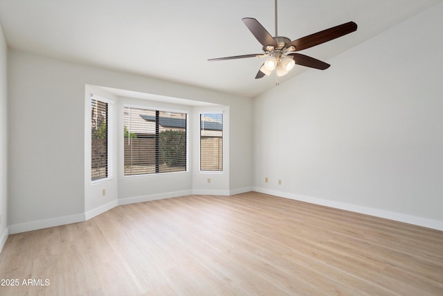 6366 W Saint John Ave, Glendale, AZ 85308 - unfurnished room featuring light wood finished floors, baseboards, lofted ceiling, and ceiling fan