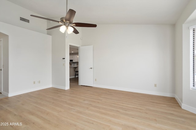 6366 W Saint John Ave, Glendale, AZ 85308 - spare room with light wood finished floors, a ceiling fan, baseboards, and lofted ceiling