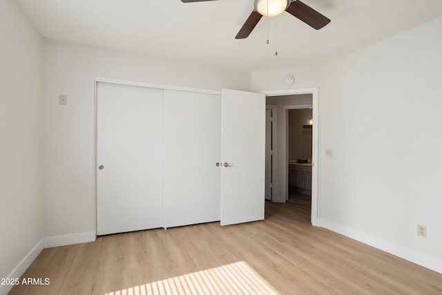 6366 W Saint John Ave, Glendale, AZ 85308 - unfurnished bedroom with light wood-style flooring, a closet, and baseboards