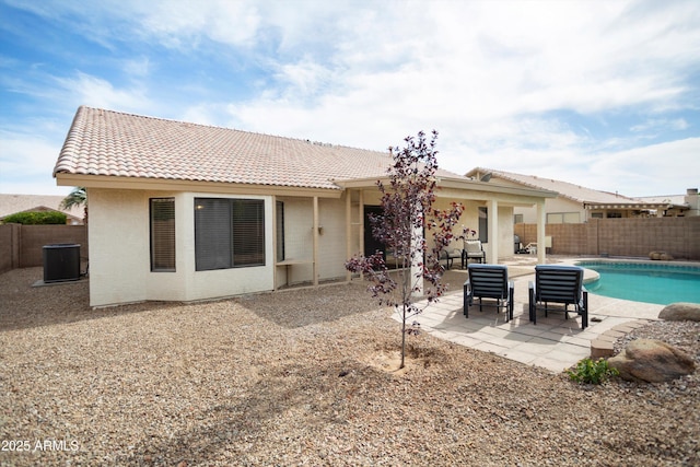6366 W Saint John Ave, Glendale, AZ 85308 - rear view of house featuring a fenced backyard, central air condition unit, and a tile roof