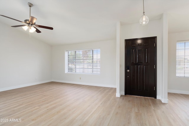 6366 W Saint John Ave, Glendale, AZ 85308 - entrance foyer featuring light wood finished floors, a ceiling fan, baseboards, and lofted ceiling