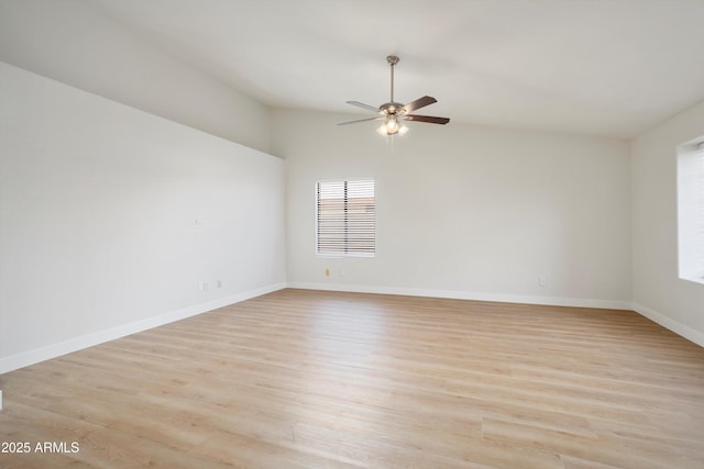 6366 W Saint John Ave, Glendale, AZ 85308 - empty room featuring ceiling fan, healthy amount of natural light, light wood-type flooring, baseboards, and vaulted ceiling