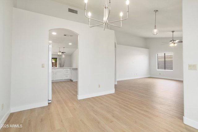 6366 W Saint John Ave, Glendale, AZ 85308 - unfurnished room featuring a ceiling fan, arched walkways, light wood finished floors, baseboards, and recessed lighting