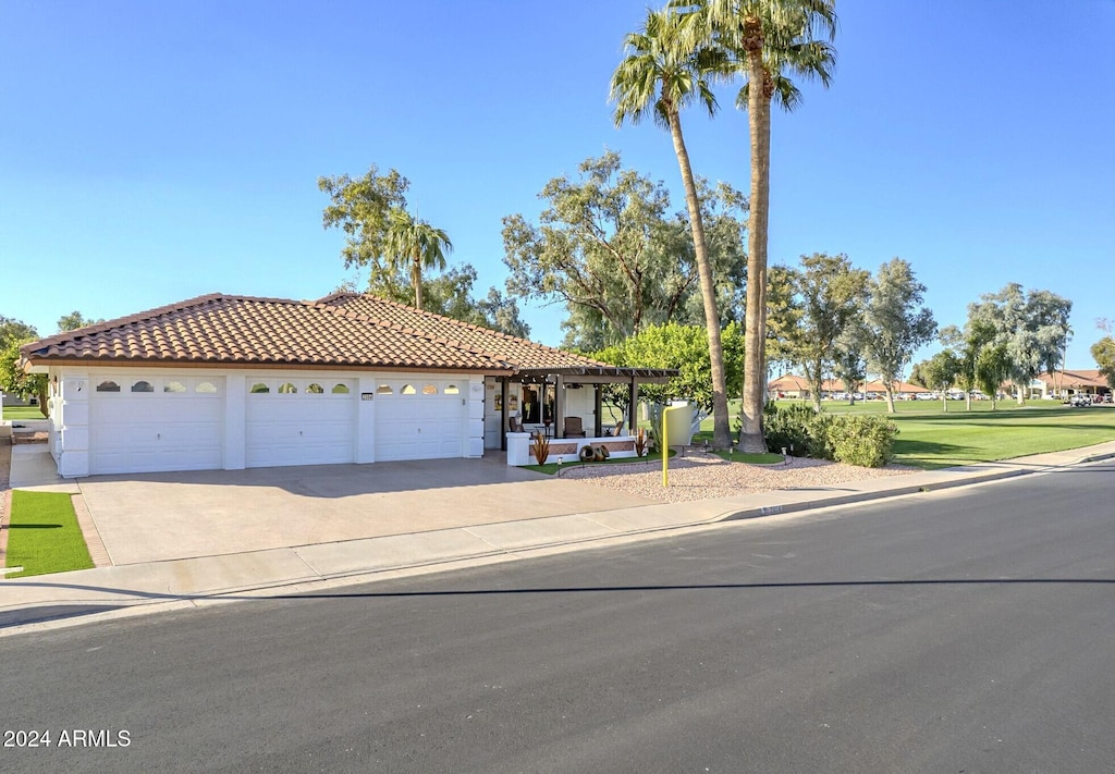 view of front of home with a garage