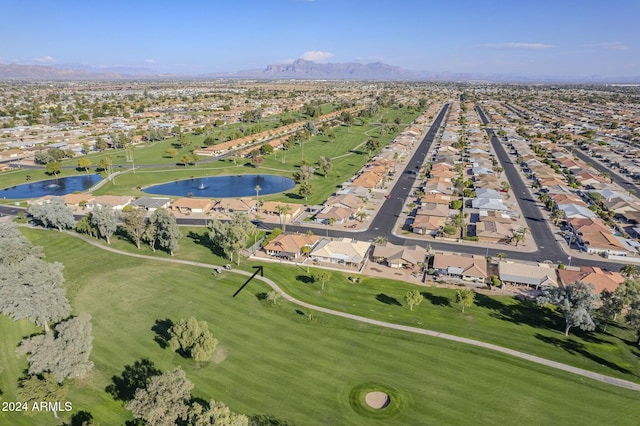 bird's eye view with a water and mountain view