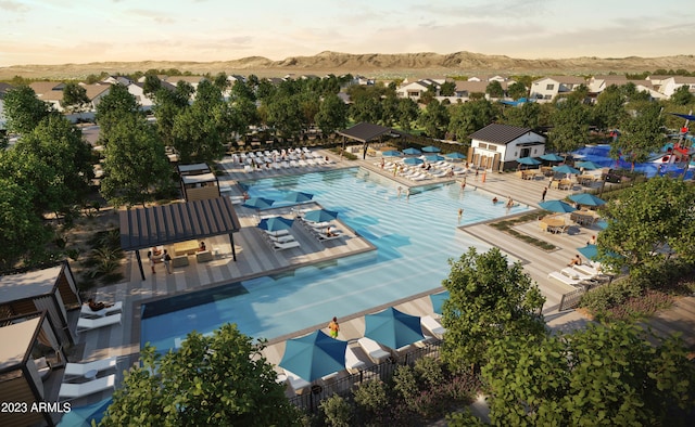 2640 W Stanton Ave, Apache Junction, AZ 85120 - community pool featuring a mountain view, a patio area, and a residential view