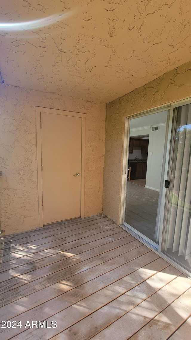 exterior space featuring wood-type flooring