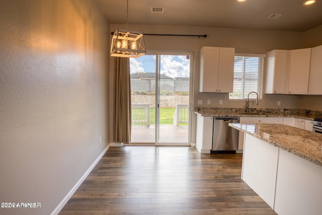 kitchen with decorative light fixtures, stainless steel dishwasher, dark wood-type flooring, and white cabinets