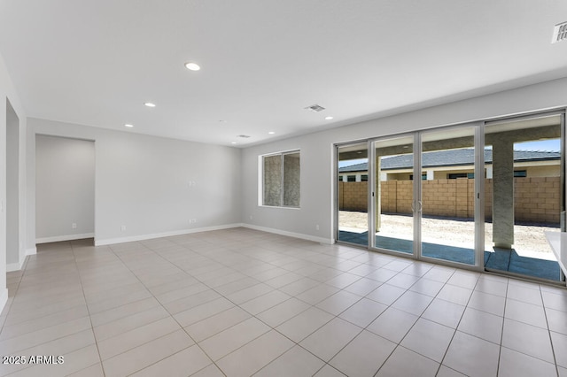 1301 W Via De Olivos, Queen Creek, AZ 85140 - tiled empty room featuring baseboards and recessed lighting