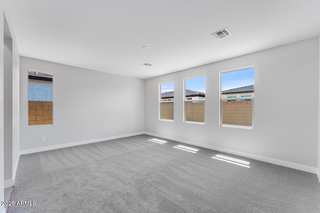 1301 W Via De Olivos, Queen Creek, AZ 85140 - carpeted spare room featuring baseboards