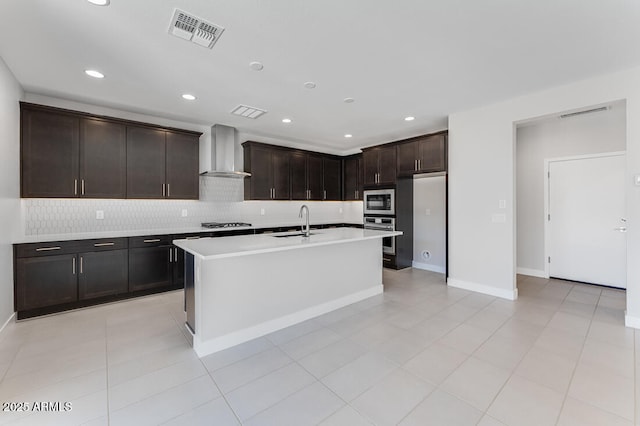 1301 W Via De Olivos, Queen Creek, AZ 85140 - kitchen with wall chimney range hood, a sink, stainless steel appliances, backsplash, and light countertops