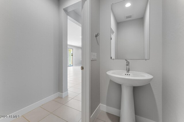 1301 W Via De Olivos, Queen Creek, AZ 85140 - bathroom with tile patterned floors and baseboards